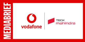 Banner with Vodafone and Tech Mahindra logos side by side on a white field, framed by a red MEDIABRIEF border on the left.