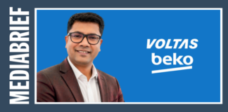 Media brief banner featuring a smiling man in a suit against a blue background with Voltas Beko branding on the right side panel reading VOLTAS beko.