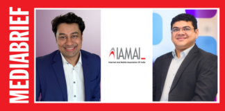 Media brief banner featuring two men in suits flanking the IAMAI logo, with red frame and vertical MEDIA BRIEF text on the side.